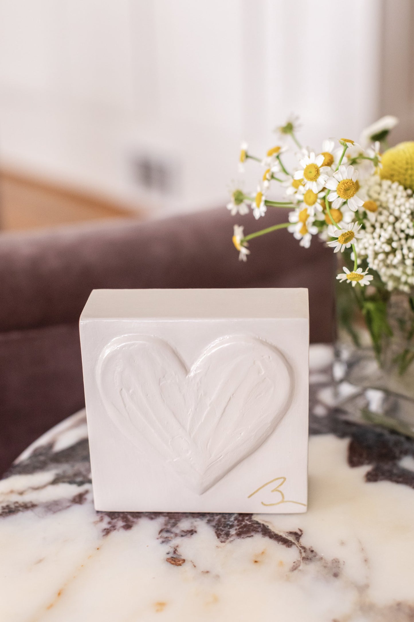 Warm Canvas hand painted heart — studio product photo showing natural cream tone with gold signature