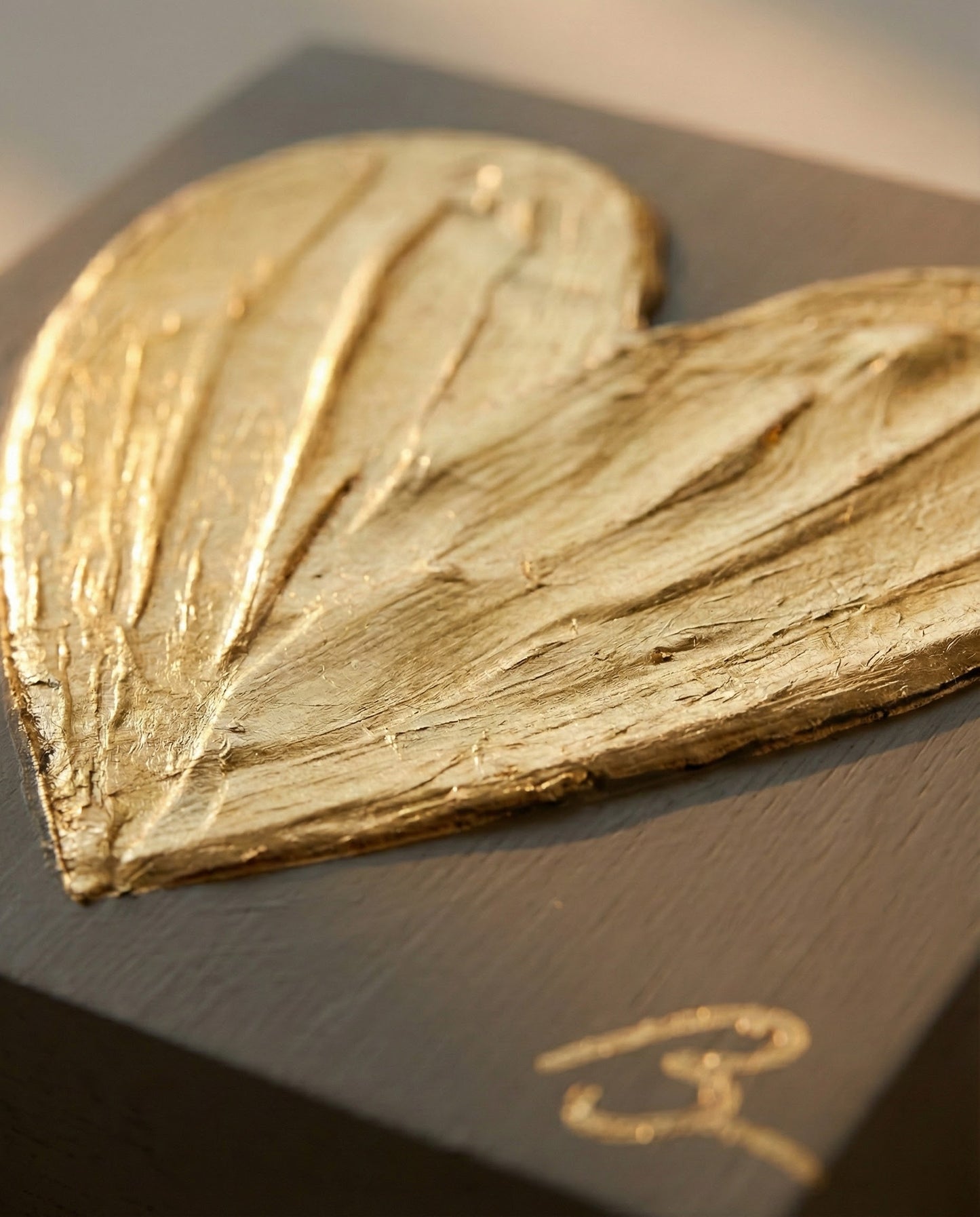 Heart of Gold close-up showing textured gold leaf impasto brushstrokes on hand painted heart