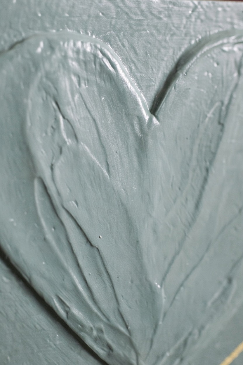 Aged Green heart block displayed on neutral surface — muted sage green with visible brushstroke texture