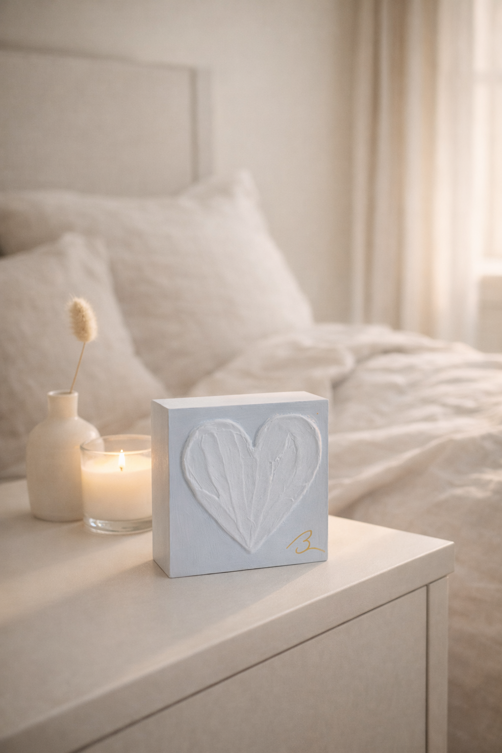 Blue Haze hand painted heart — angled view showing dimensional texture and monochromatic blue finish