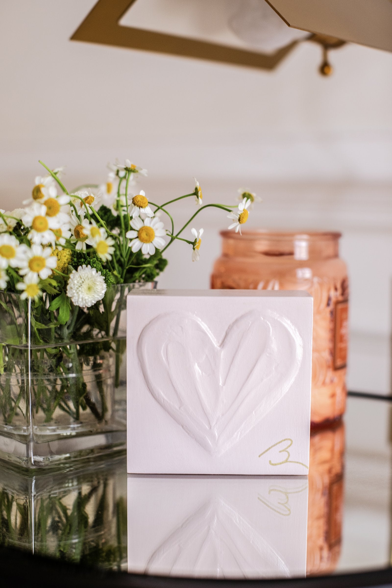 Delicate Pink wood heart sculpture — styled vignette with soft pink heart block among neutral decor