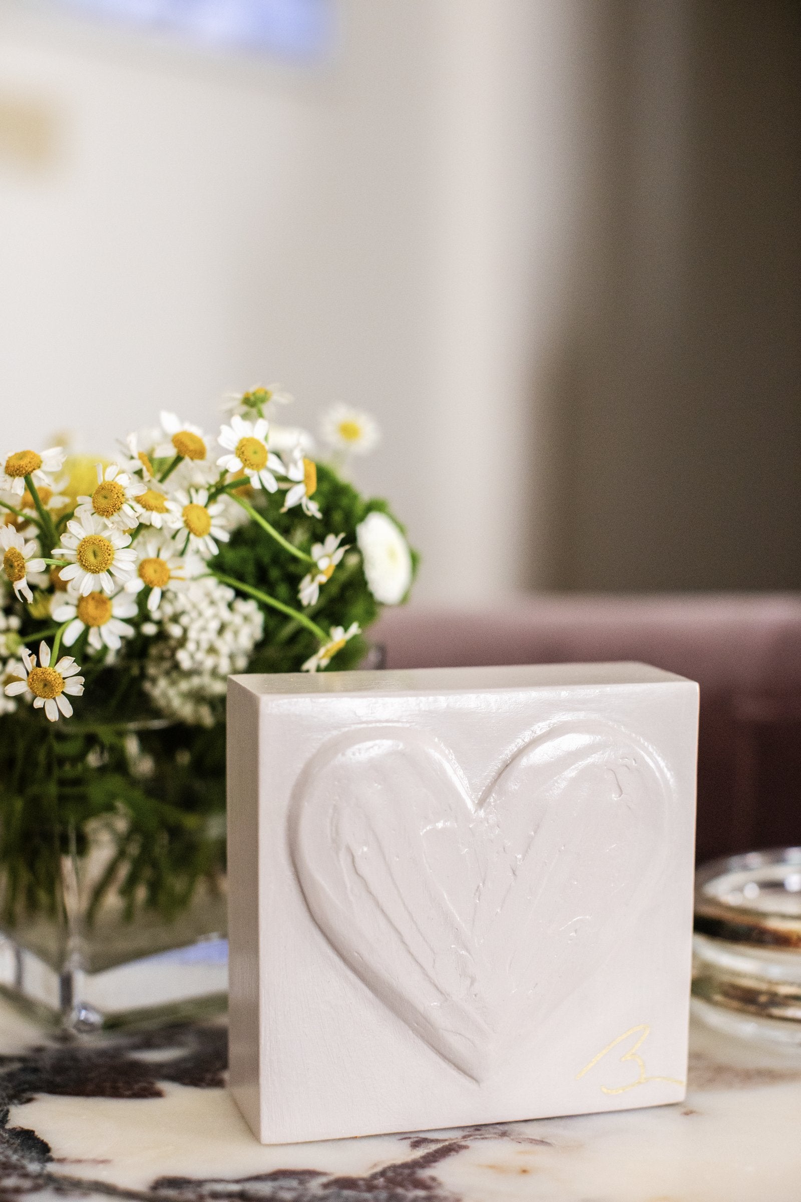 Delicate Pink hand painted heart — side profile showing raised heart dimension and texture