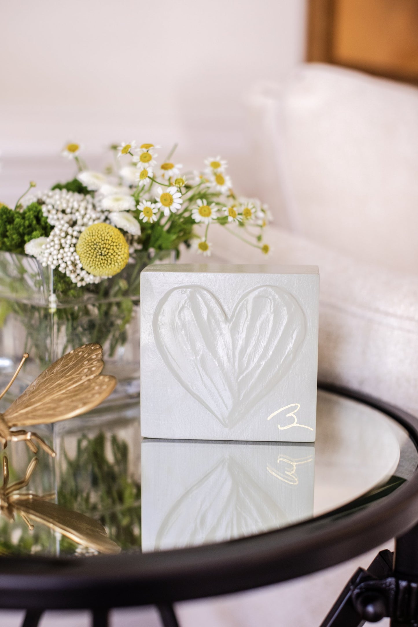 Grey Garden hand painted heart block in warm grey displayed in styled home setting