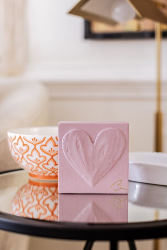 Romantic Rose heart sculpture — textured heart detail showing warm Cinder Rose tone with gold signature