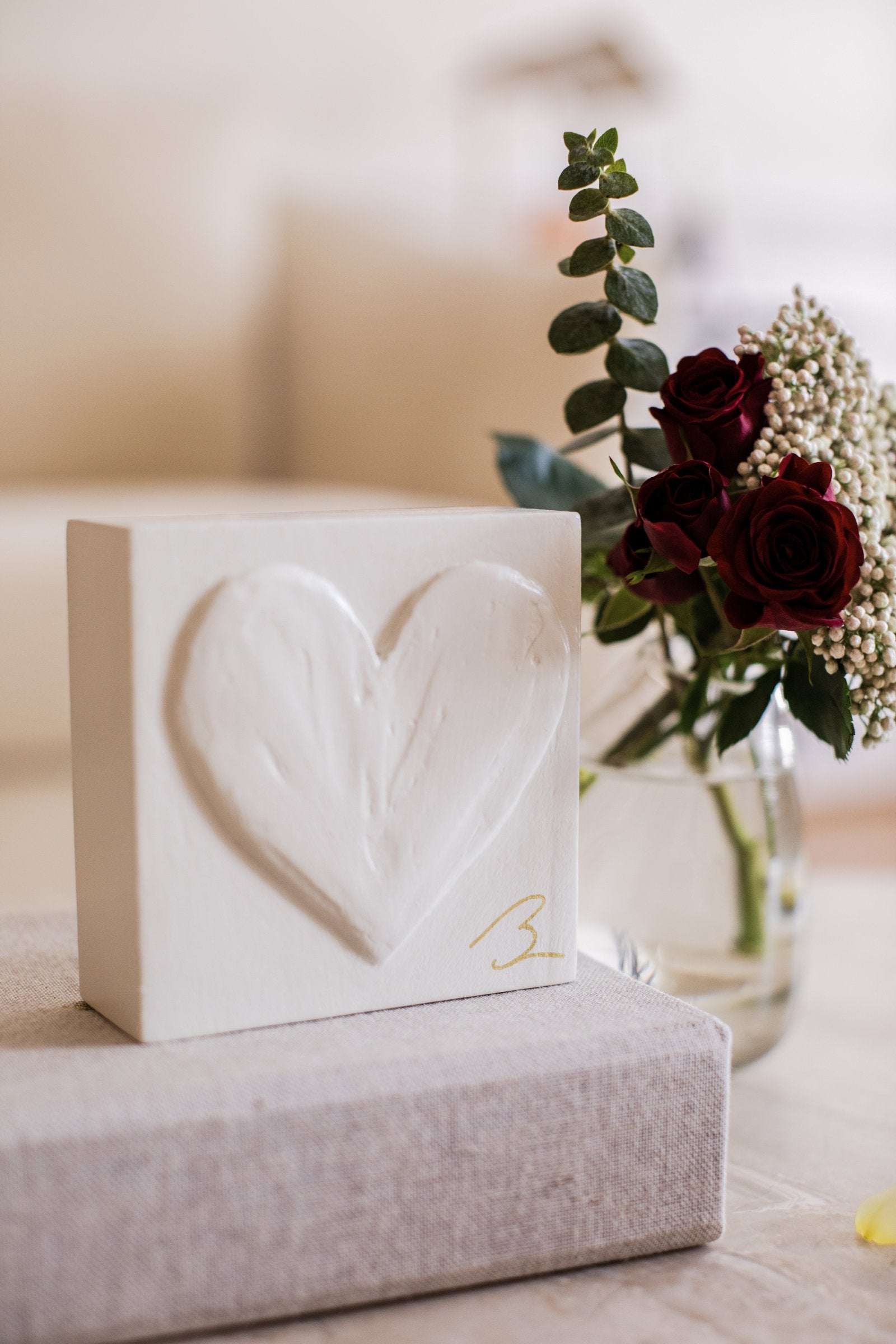 Warm Canvas wood heart block — angled view showing layered brushstroke texture in natural canvas